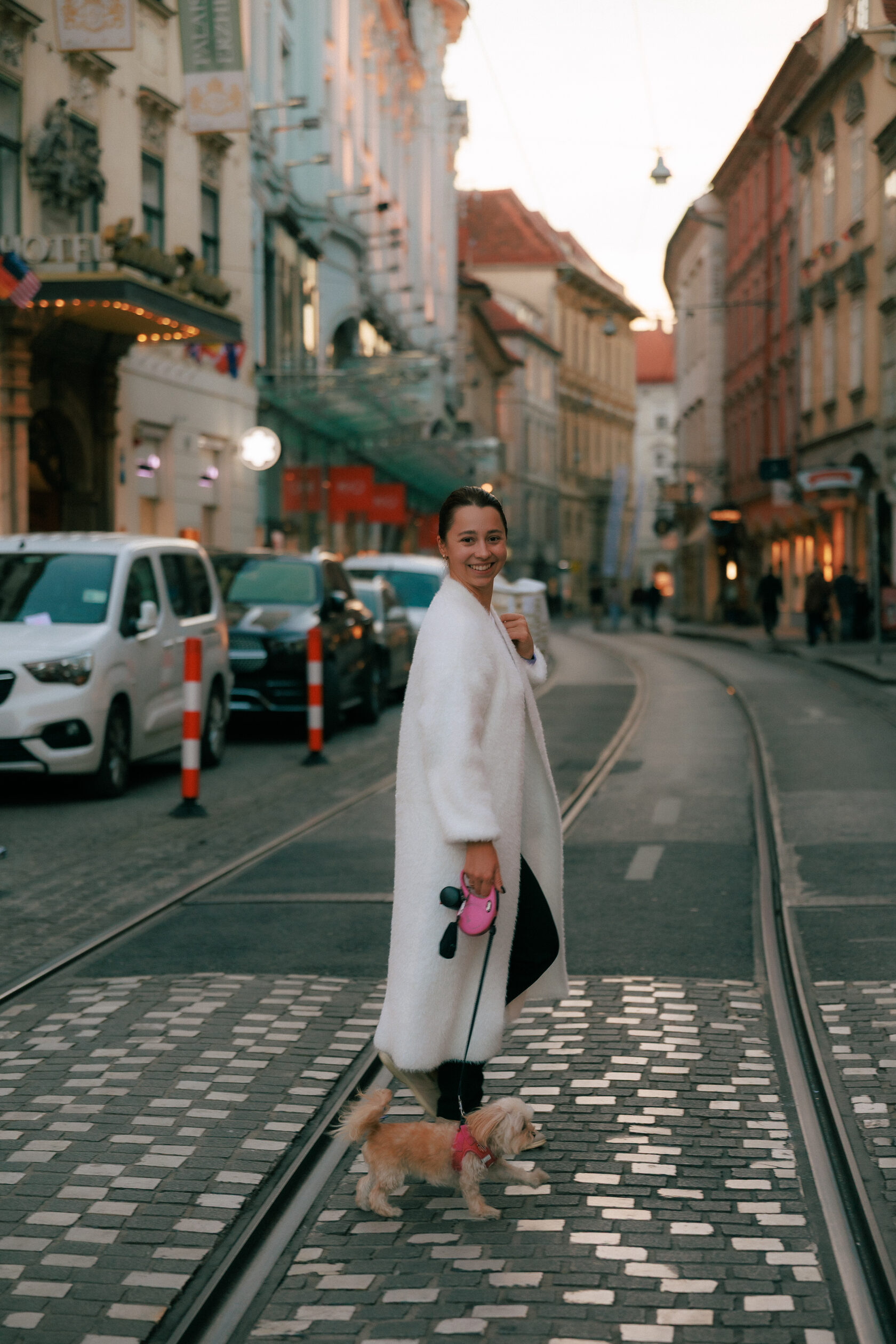 Victoria walking her dog in Graz old town