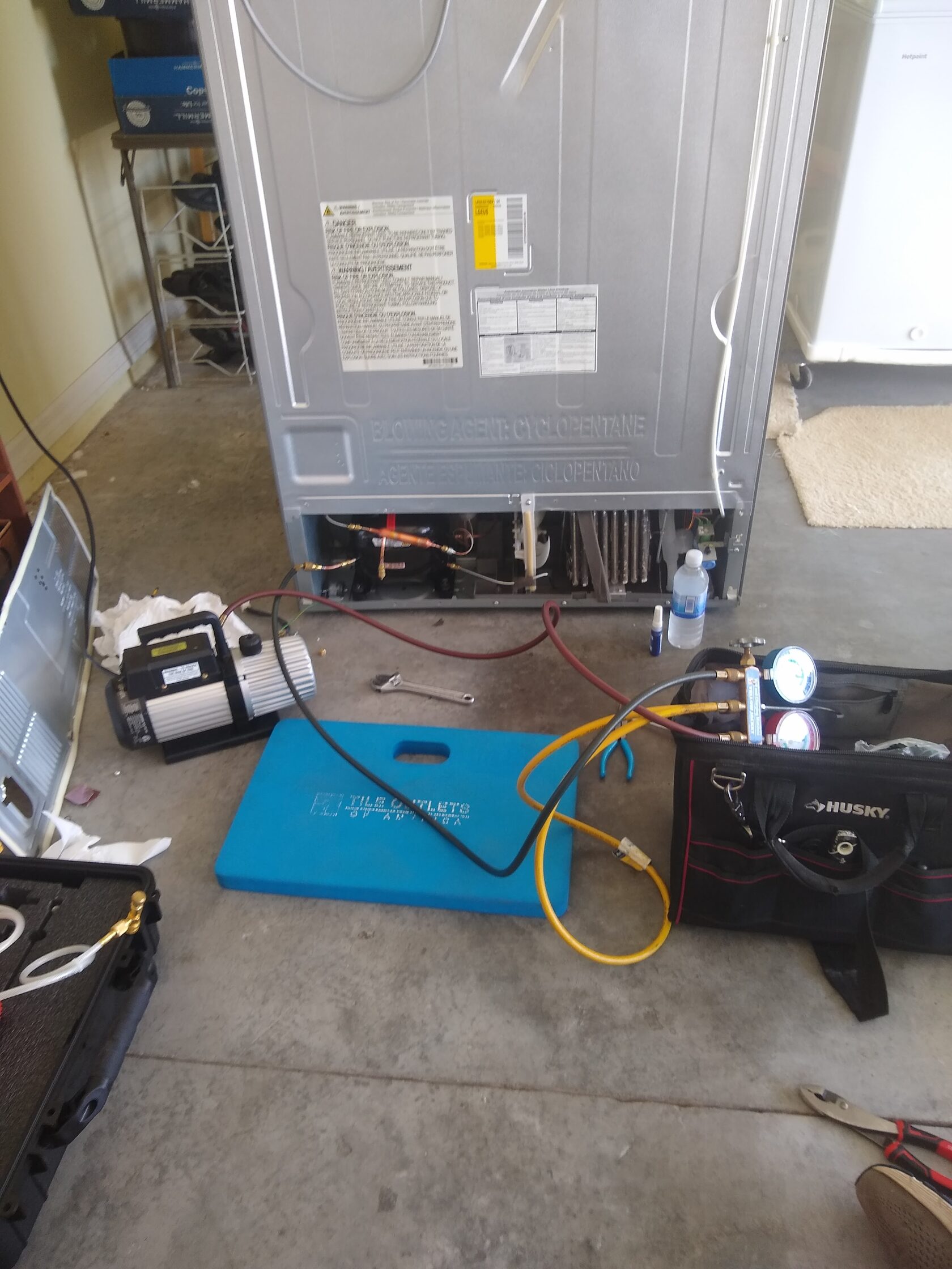 preparing to replace the LG refrigerator compressor